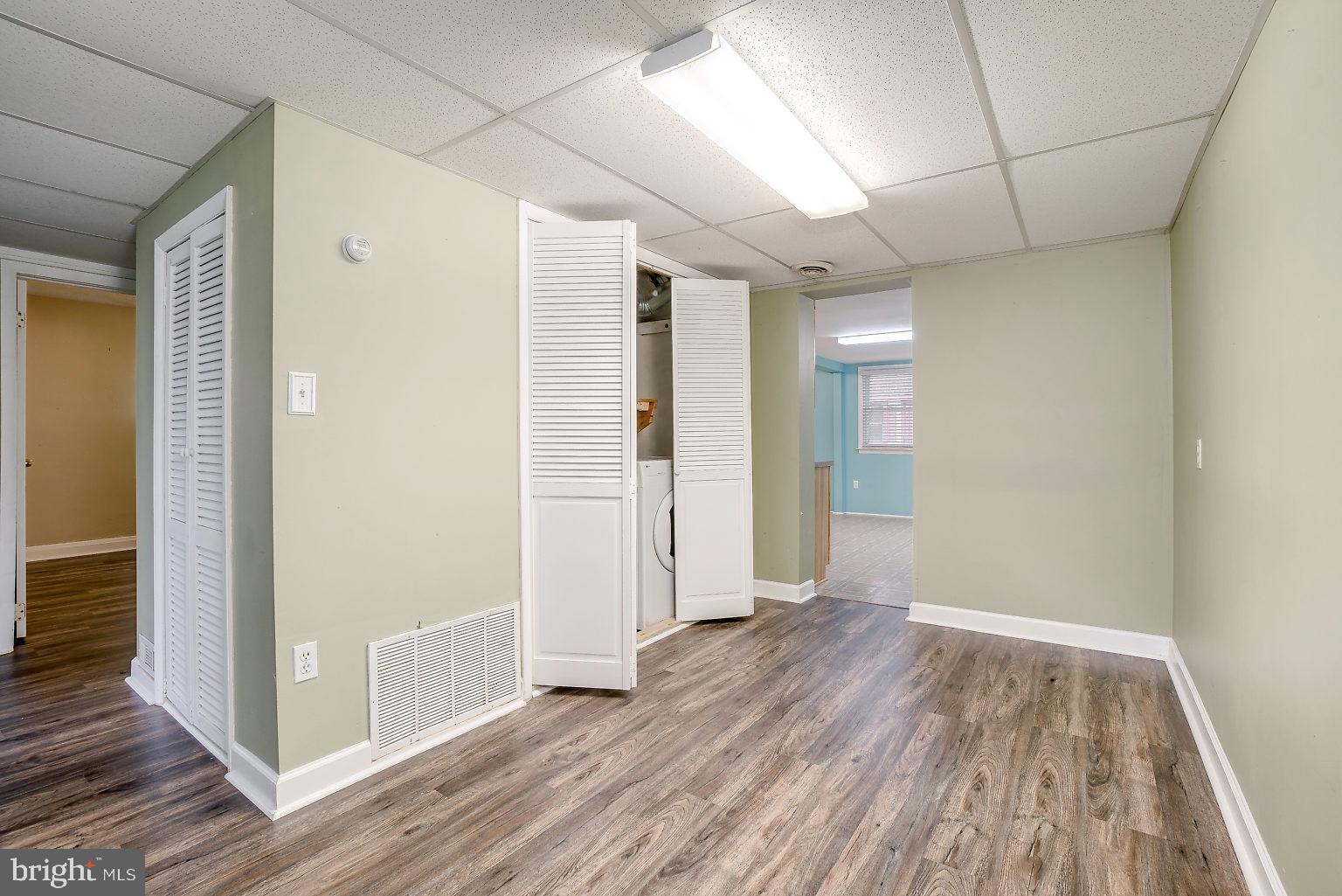 7708 Fairgreen Road Baltimore, MD 21222 - Photo 18 of 44 a view of hallway with wooden floor