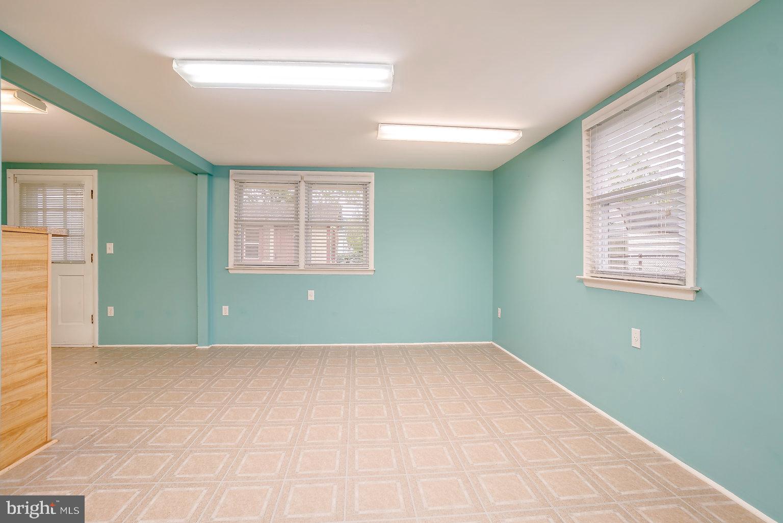 7708 Fairgreen Road Baltimore, MD 21222 - Photo 23 of 44 an empty room with windows