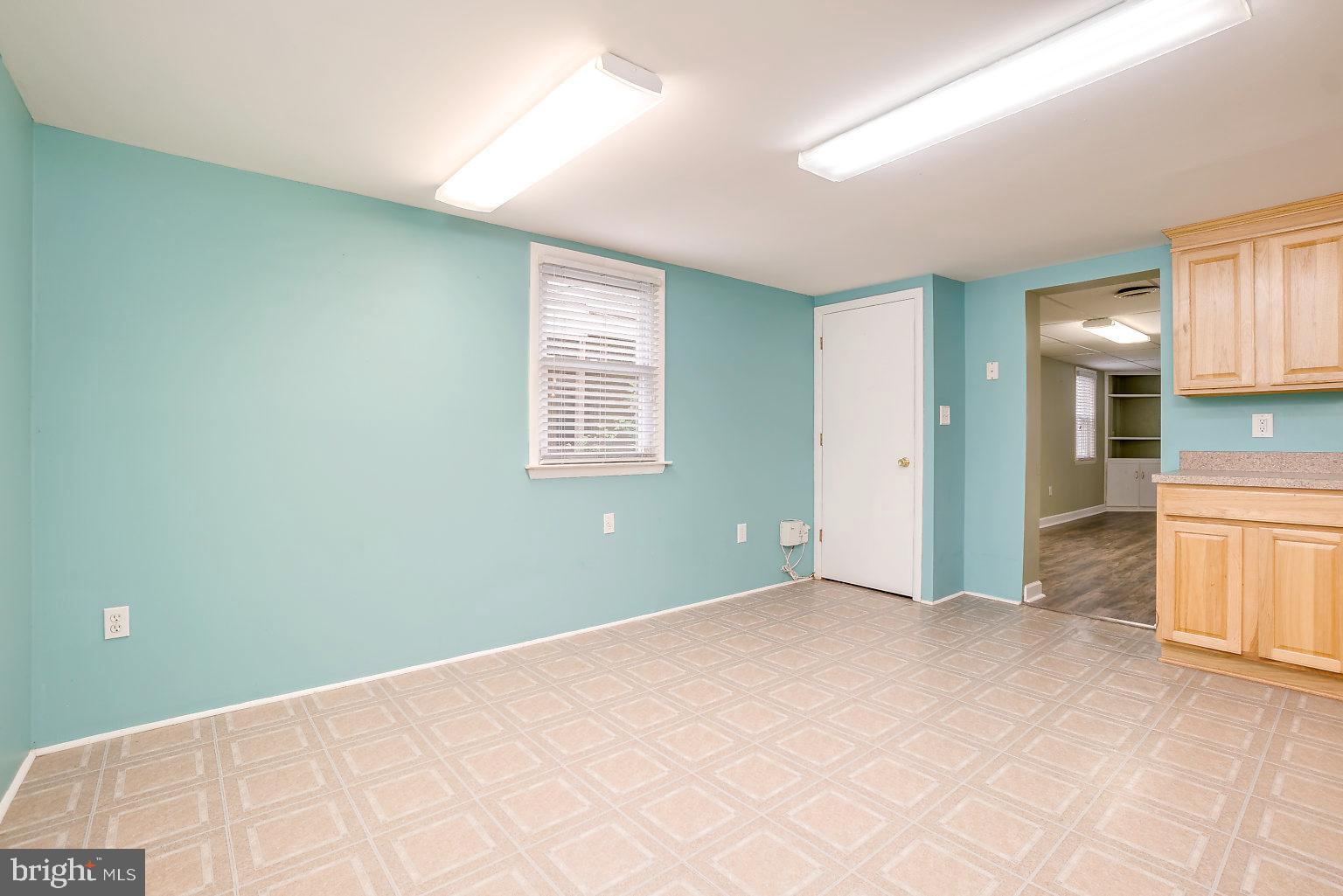 7708 Fairgreen Road Baltimore, MD 21222 - Photo 25 of 44 a view of an empty room with a window