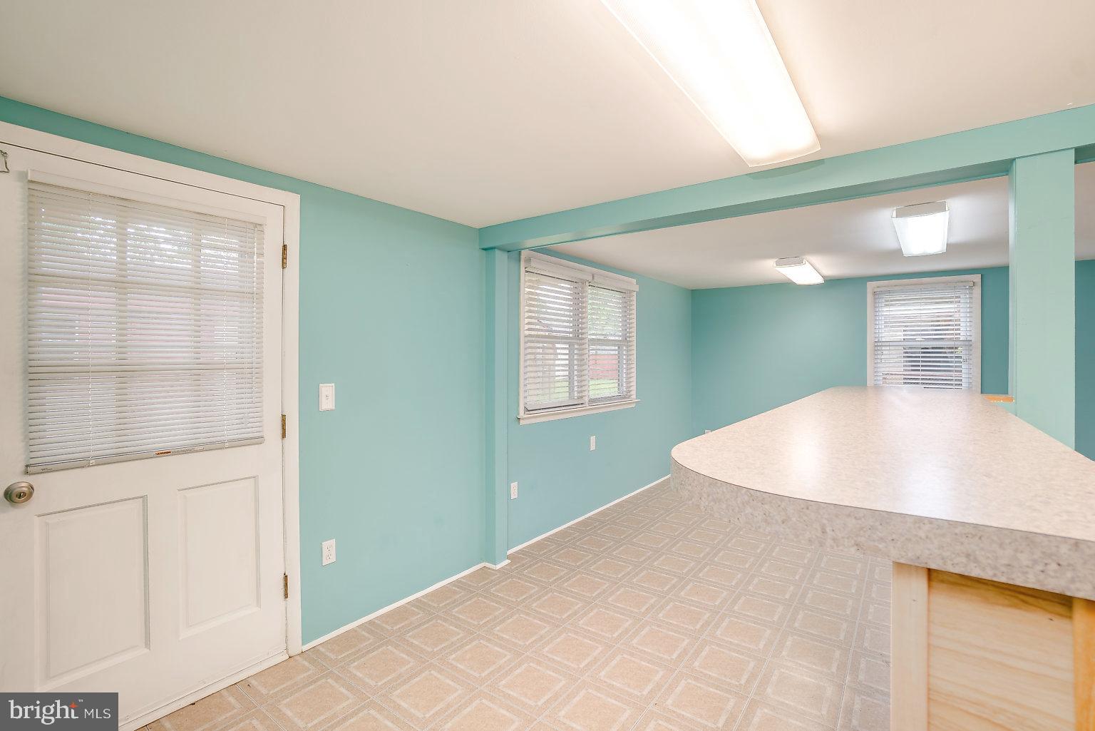 7708 Fairgreen Road Baltimore, MD 21222 - Photo 30 of 44 a view of a kitchen from the hallway