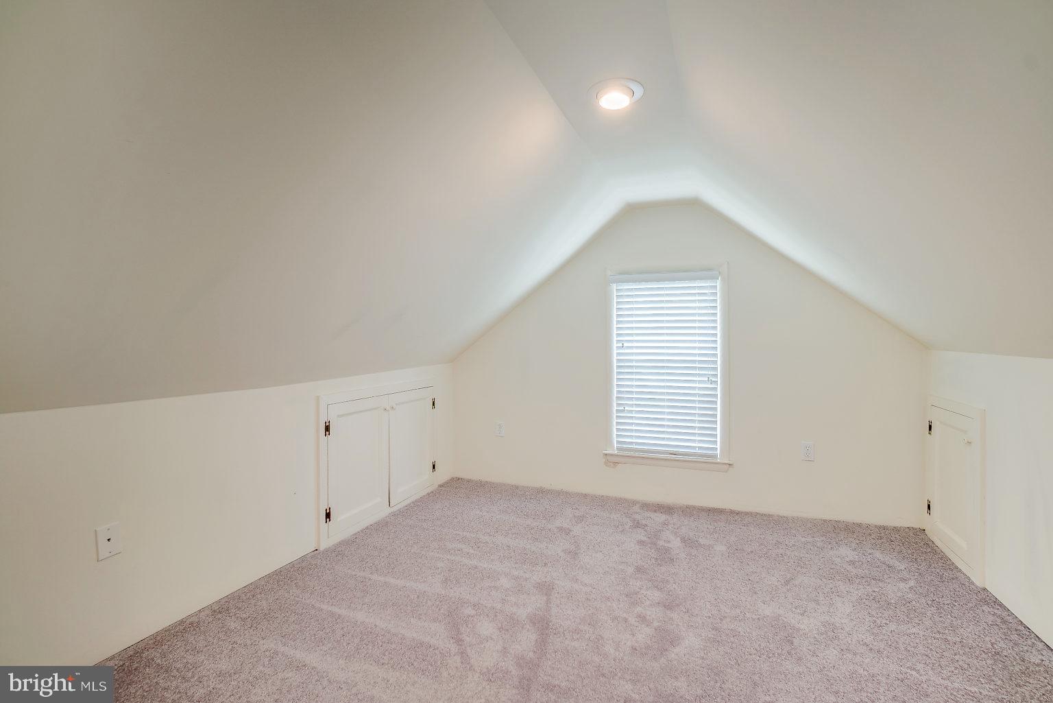 7708 Fairgreen Road Baltimore, MD 21222 - Photo 34 of 44 an empty room with windows and brick walls