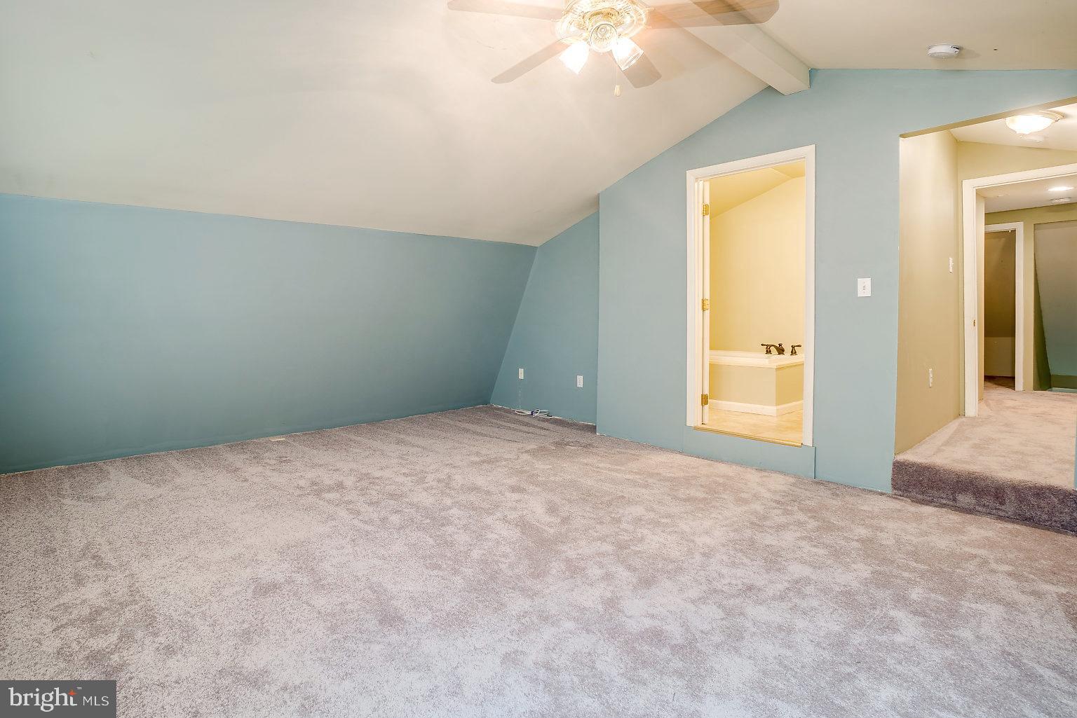 7708 Fairgreen Road Baltimore, MD 21222 - Photo 38 of 44 en empty room with windows and closet