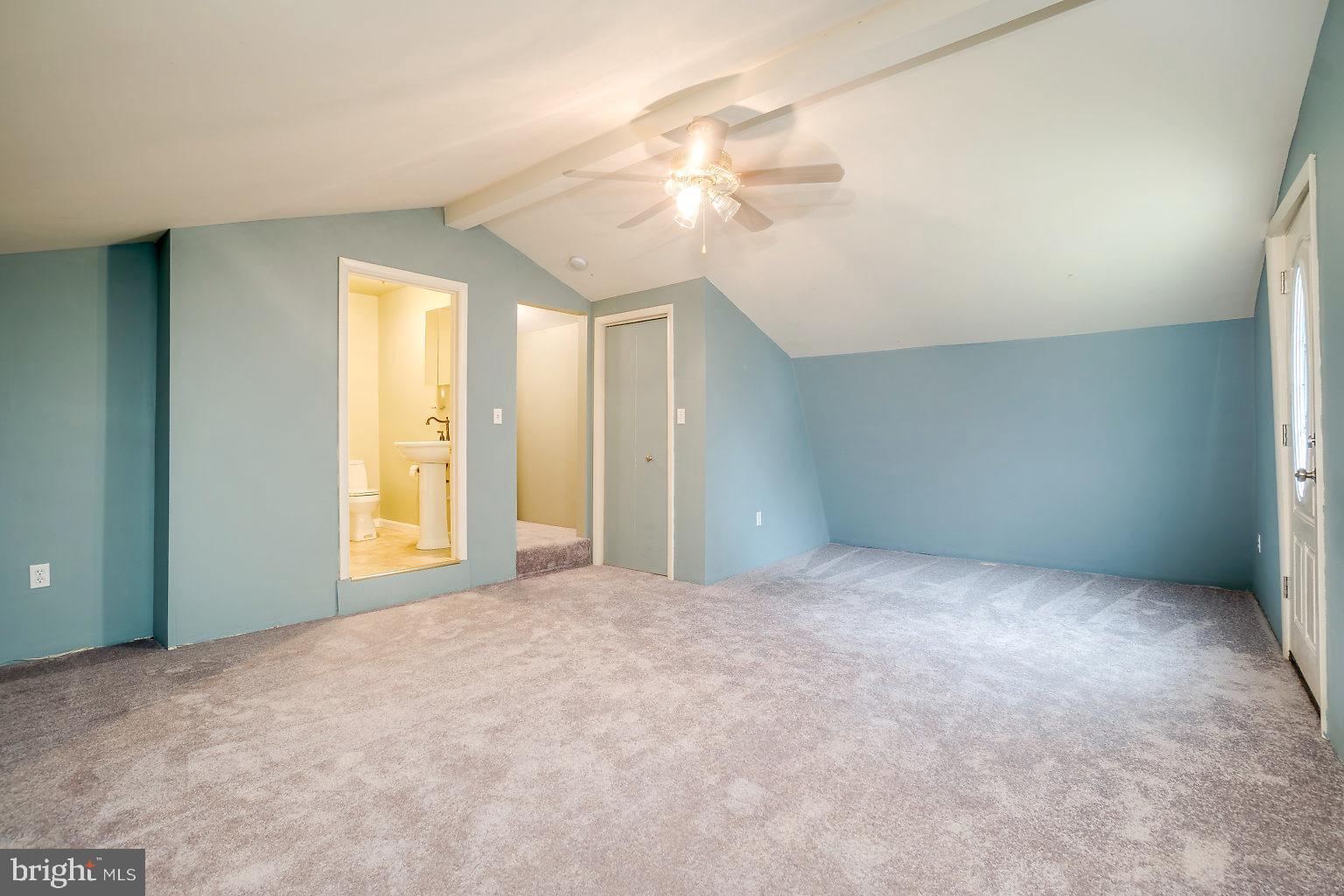 7708 Fairgreen Road Baltimore, MD 21222 - Photo 39 of 44 a view of an empty room with a chandelier fan