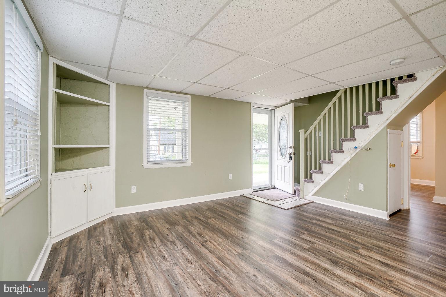 7708 Fairgreen Road Baltimore, MD 21222 - Photo 10 of 44 a view of entryway with wooden floor