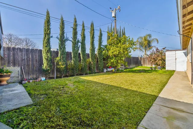 an aerial view of a house with swimming pool