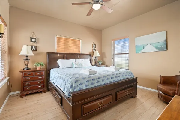 a bedroom with a bed and furniture