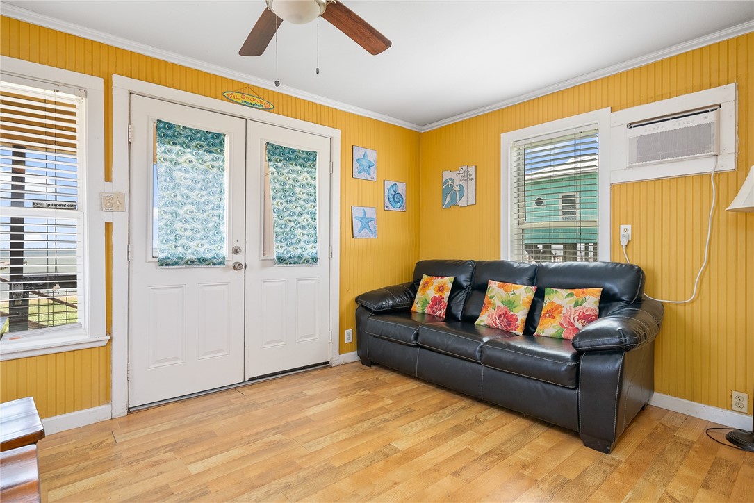 384 Egery Island Road Woodsboro, TX 78393 - Photo 21 of 37 a living room with furniture and a window