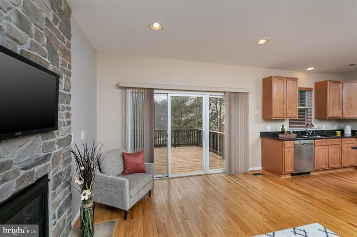 5914 Pimlico Road Baltimore, MD 21209 - Photo 16 of 37 Family room leads to deck