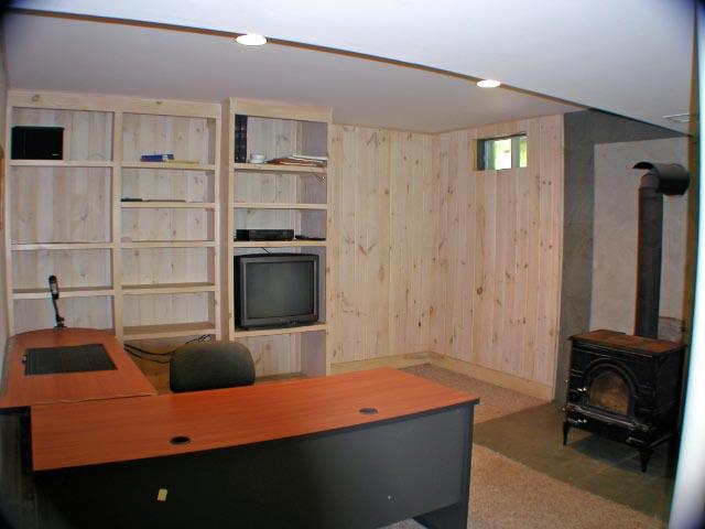 1190 West Center Road Otis, MA 01253 - Photo 7 of 9 a room with furniture and a flat screen tv