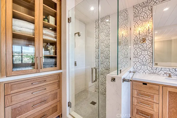 a bathroom with a bathtub and a shower