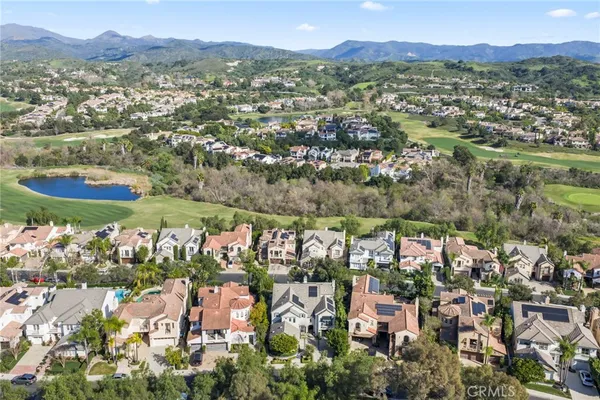 a aerial view of a house with swimming pool