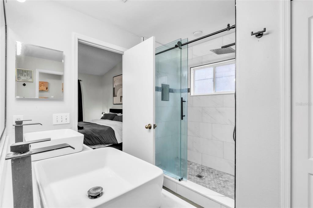 12410 Early Run Lane Riverview, FL 33578 - Photo 21 of 34 a bathroom with a sink and a mirror