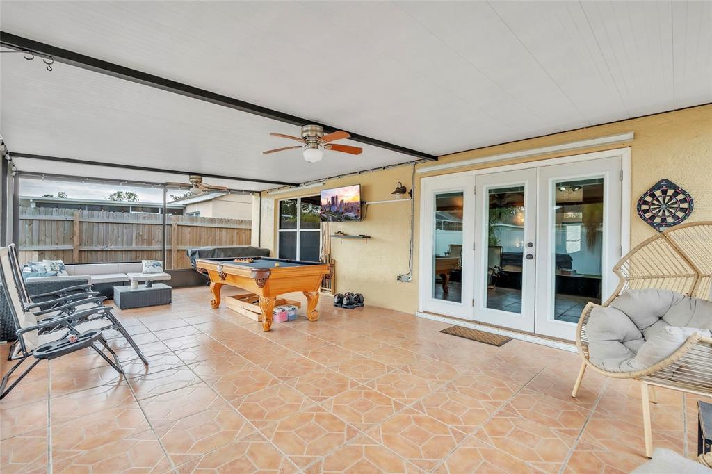 12410 Early Run Lane Riverview, FL 33578 - Photo 23 of 34 a outdoor space with patio furniture and white walls