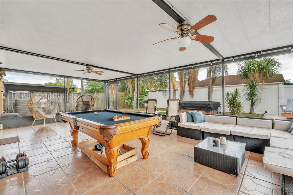 12410 Early Run Lane Riverview, FL 33578 - Photo 24 of 34 a living room with furniture a table and a large window