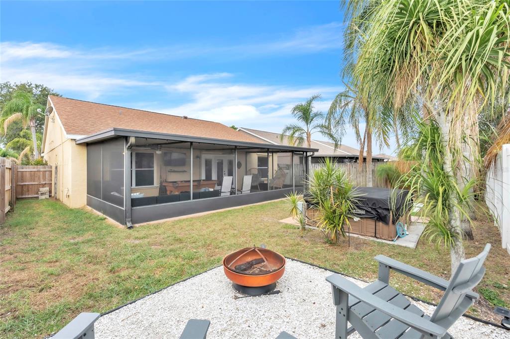 12410 Early Run Lane Riverview, FL 33578 - Photo 26 of 34 a view of a house with backyard and sitting area
