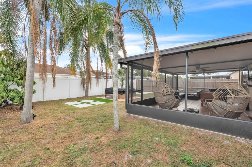 12410 Early Run Lane Riverview, FL 33578 - Photo 28 of 34 a view of a yard with table and chairs