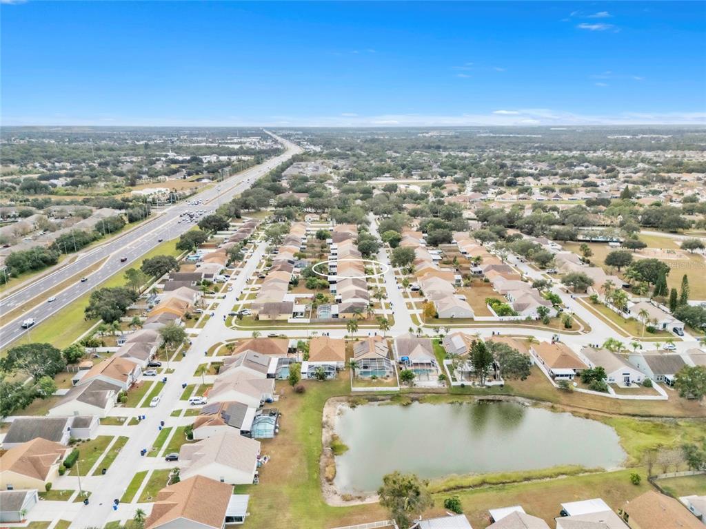 12410 Early Run Lane Riverview, FL 33578 - Photo 31 of 34 an aerial view of residential houses with outdoor space