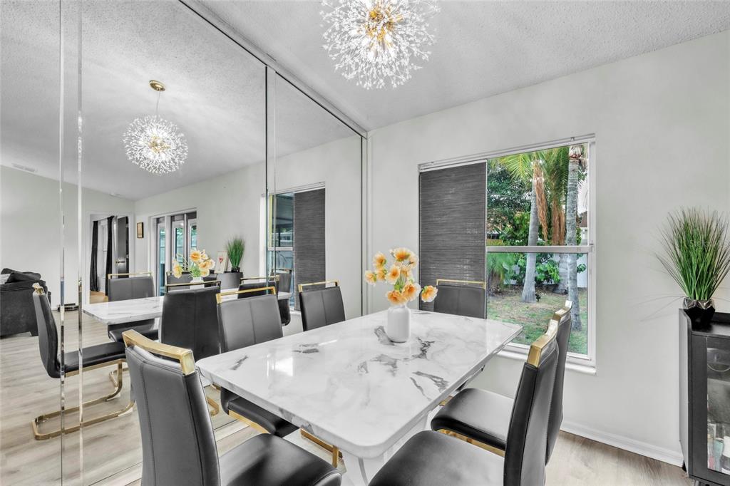 12410 Early Run Lane Riverview, FL 33578 - Photo 7 of 34 a view of a dining room with furniture window and outside view