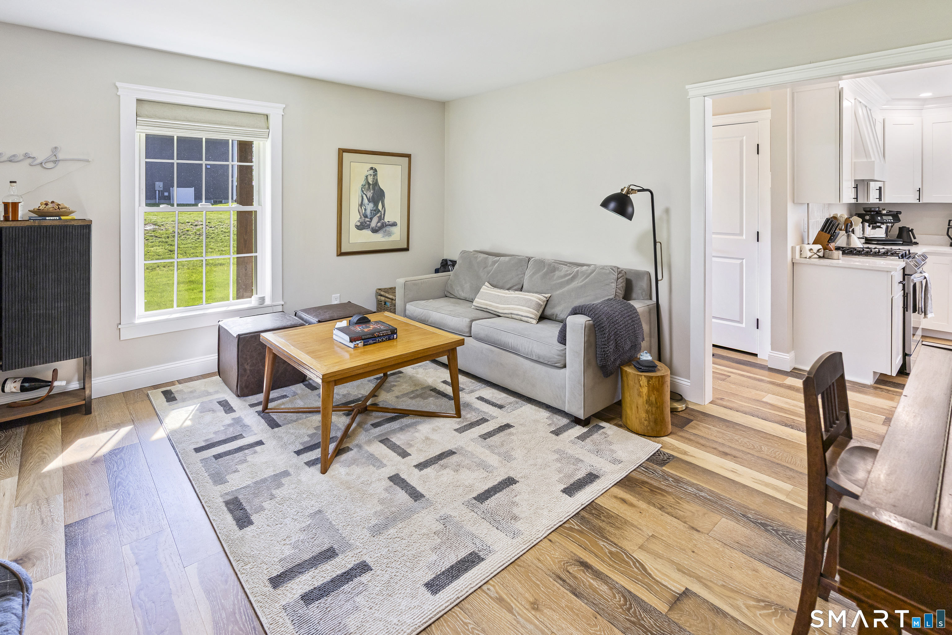29 Beecher Road Brooklyn, CT 06234 - Photo 22 of 40 a living room with furniture and a flat screen tv