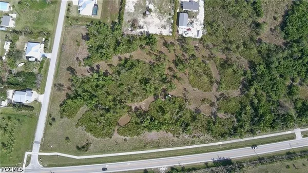 a view of a yard from a balcony