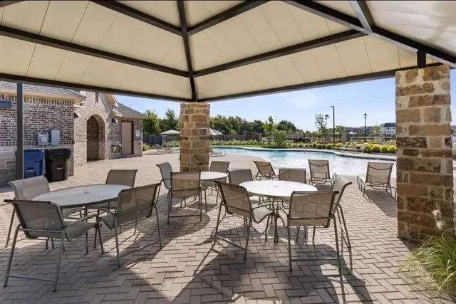 a view of a park with large trees