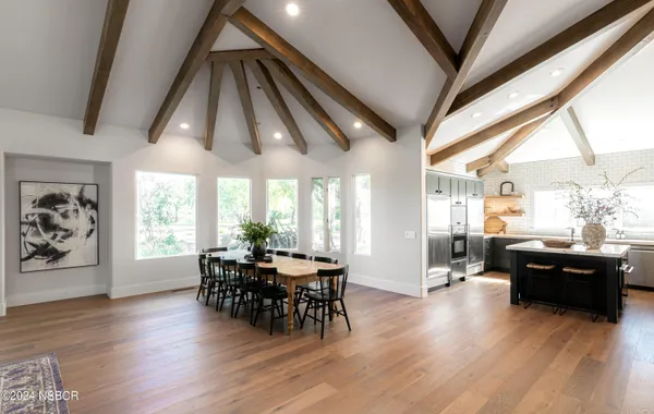 an aerial view of houses with yard