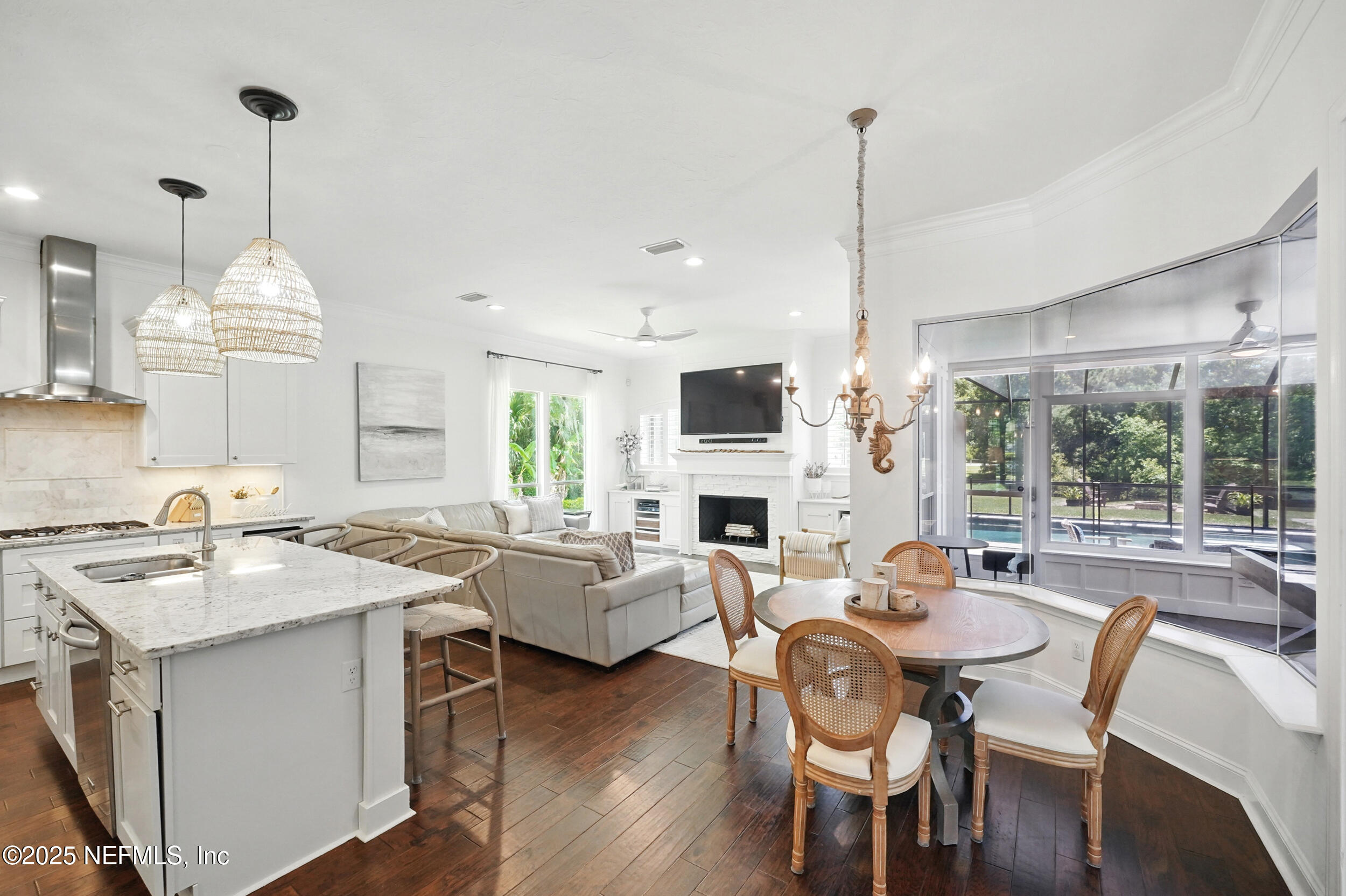 150 South Roscoe Boulevard Ponte Vedra Beach, FL 32082 - Photo 15 of 84 a view of a dining room with furniture window and wooden floor