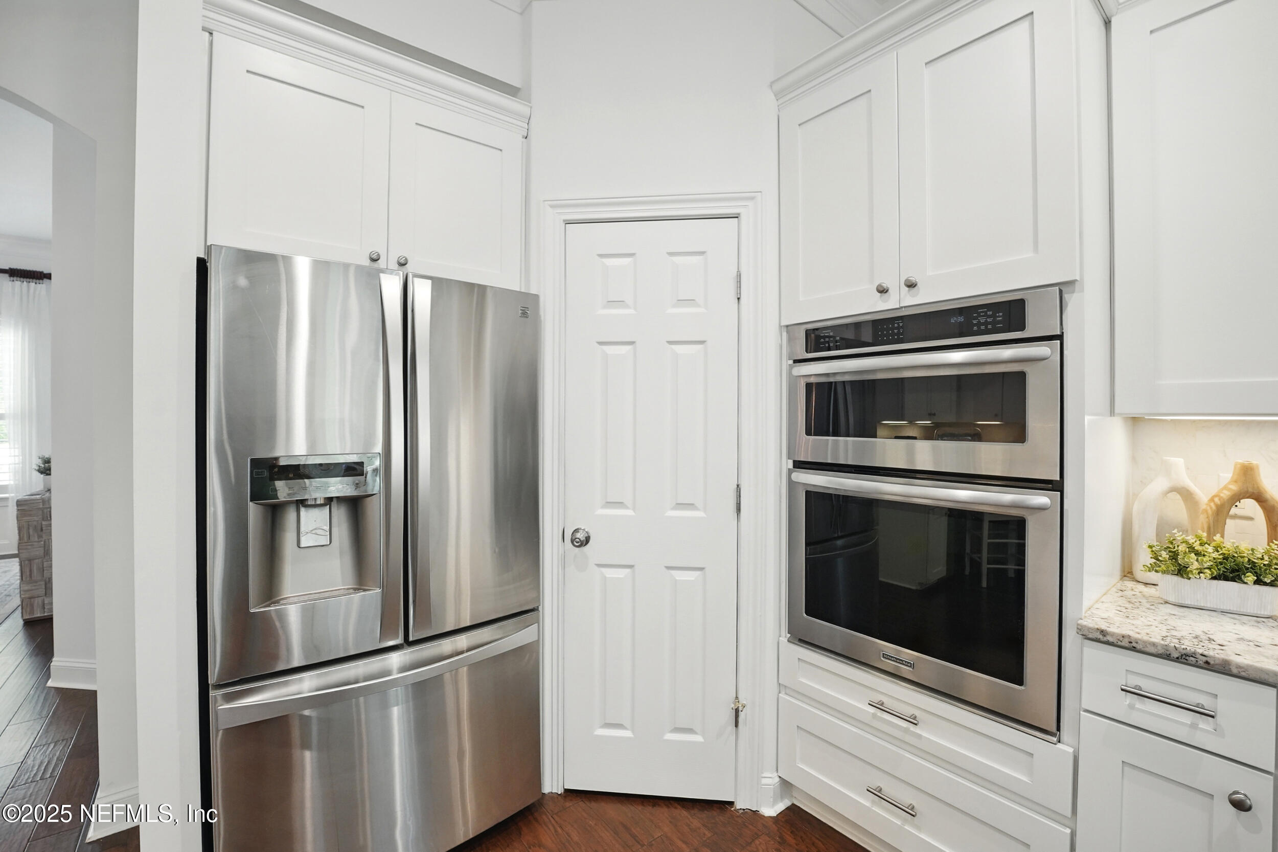150 South Roscoe Boulevard Ponte Vedra Beach, FL 32082 - Photo 19 of 84 a metallic refrigerator freezer and a stove sitting inside of a kitchen