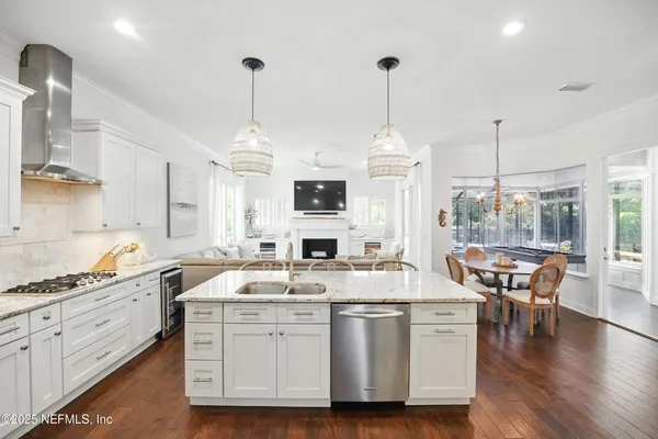 a bath tub sitting next to a window