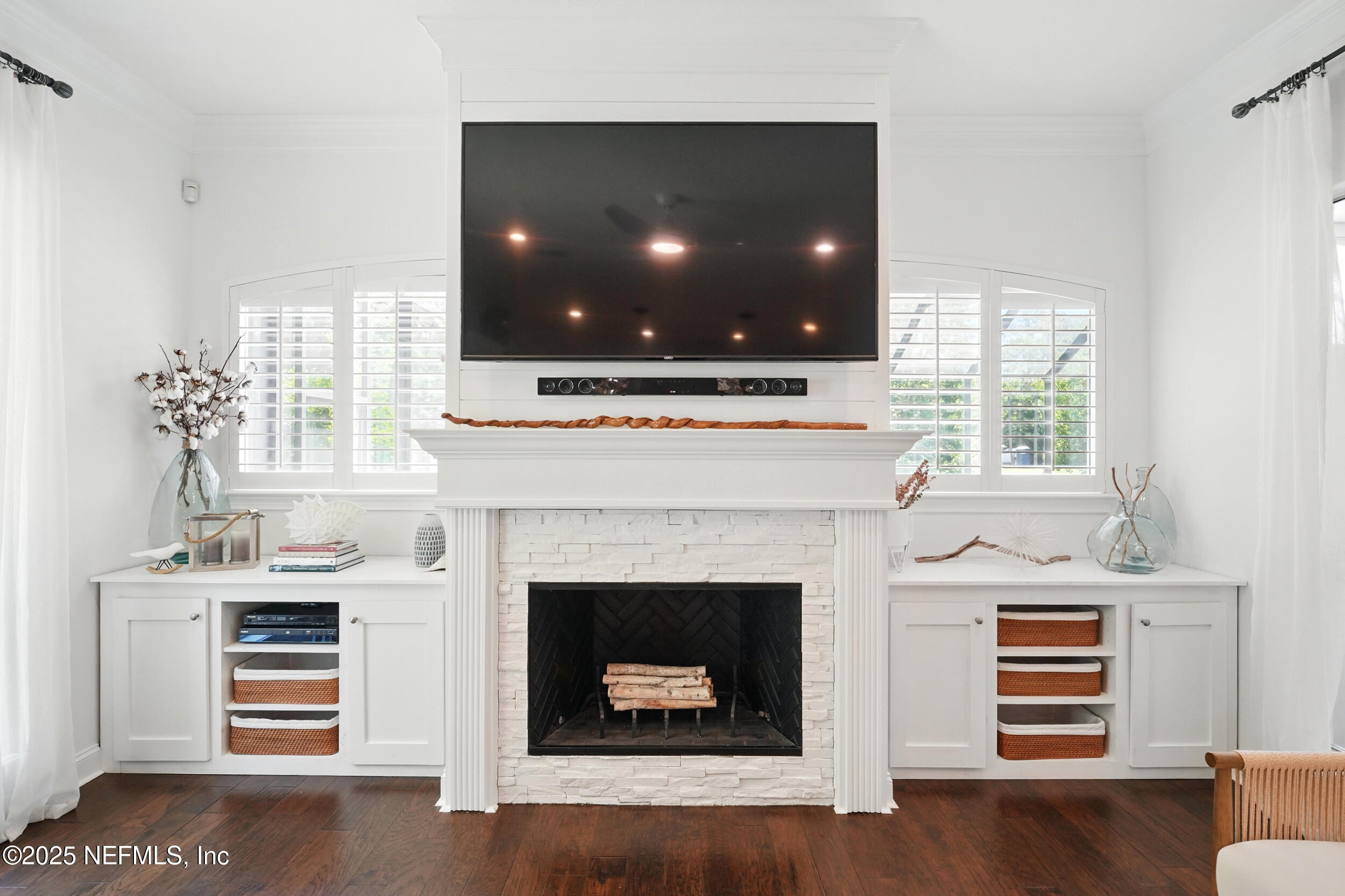 150 South Roscoe Boulevard Ponte Vedra Beach, FL 32082 - Photo 27 of 84 a living room with furniture and a fireplace