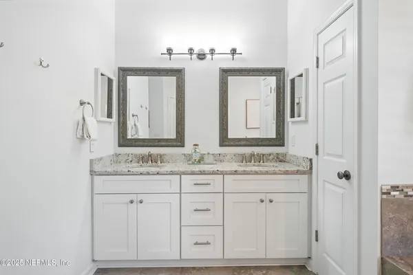 a bathroom with a shower a toilet and a shower