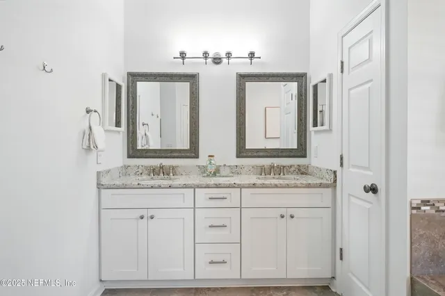 a bathroom with a shower a toilet and a shower