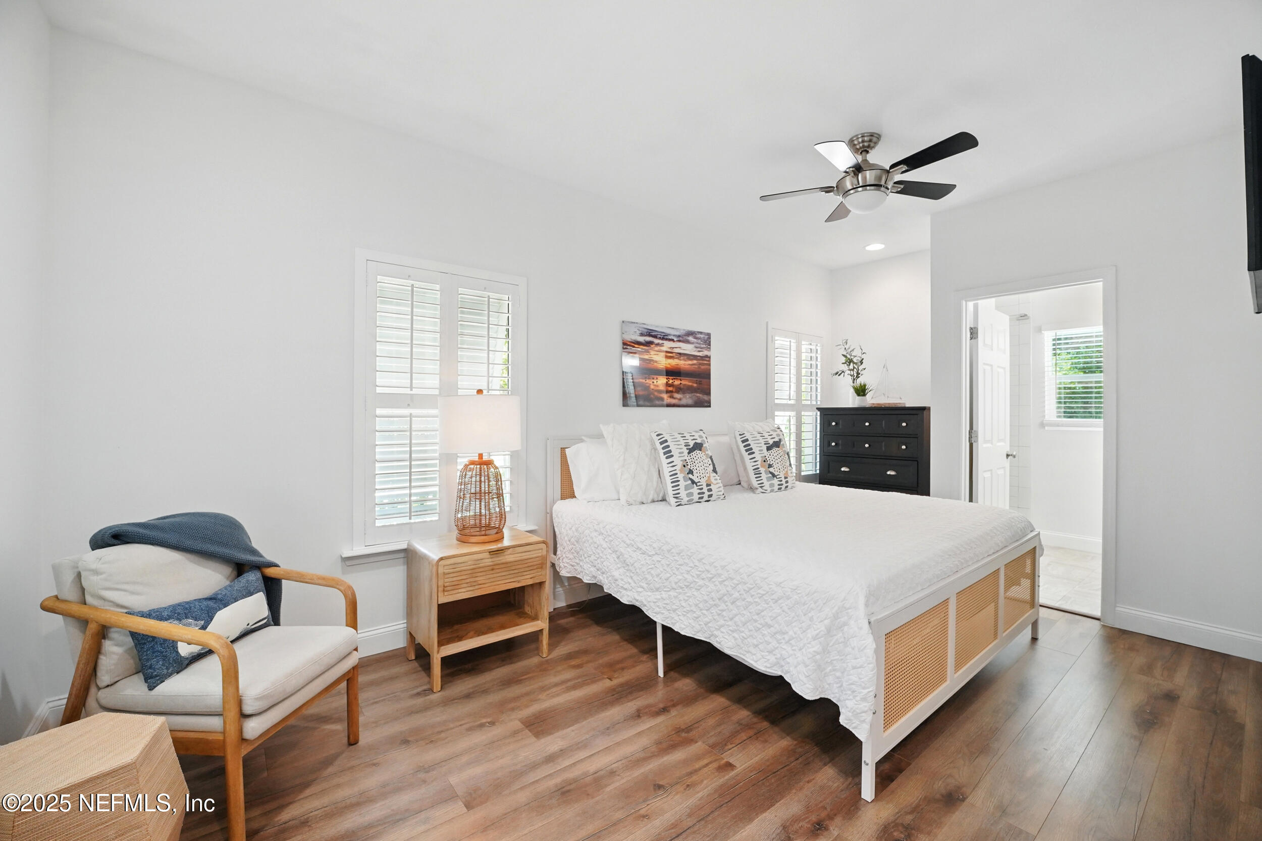 150 South Roscoe Boulevard Ponte Vedra Beach, FL 32082 - Photo 35 of 84 a living room with furniture and a wooden floor