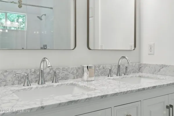 a view of swimming pool with outdoor seating