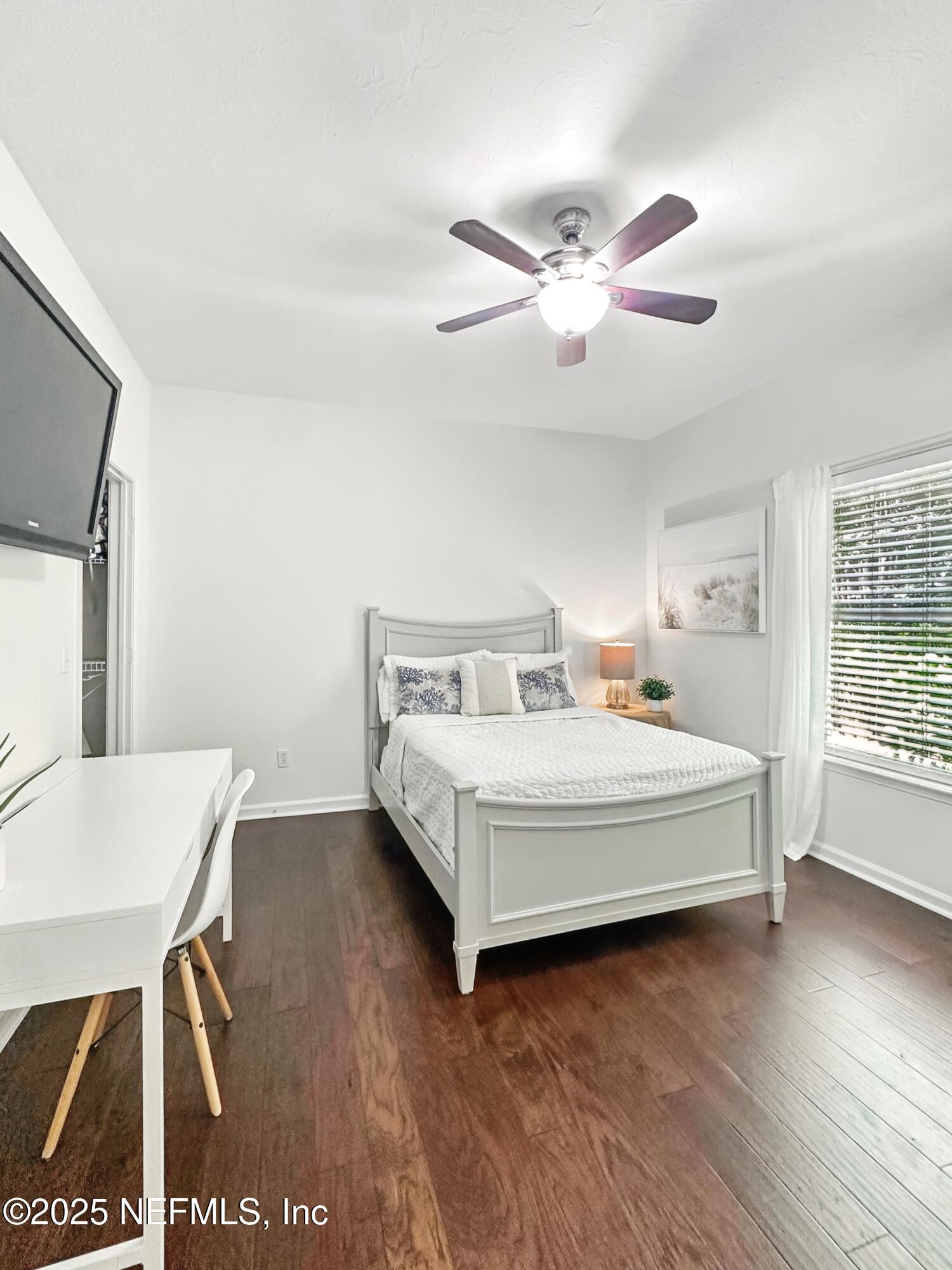 150 South Roscoe Boulevard Ponte Vedra Beach, FL 32082 - Photo 44 of 84 a white bed sitting in a bedroom next to a window