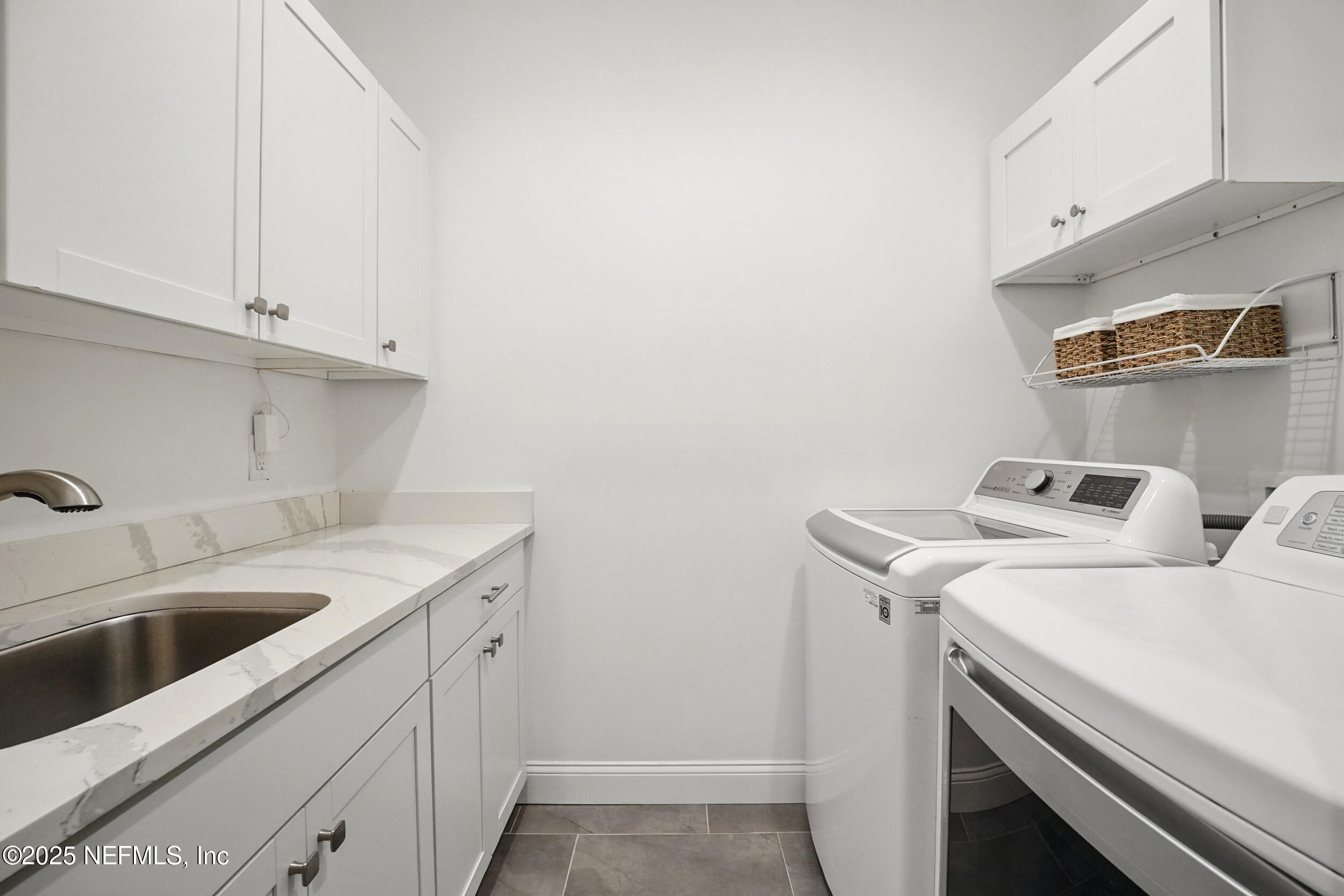 150 South Roscoe Boulevard Ponte Vedra Beach, FL 32082 - Photo 52 of 84 a utility room with dryer and washer