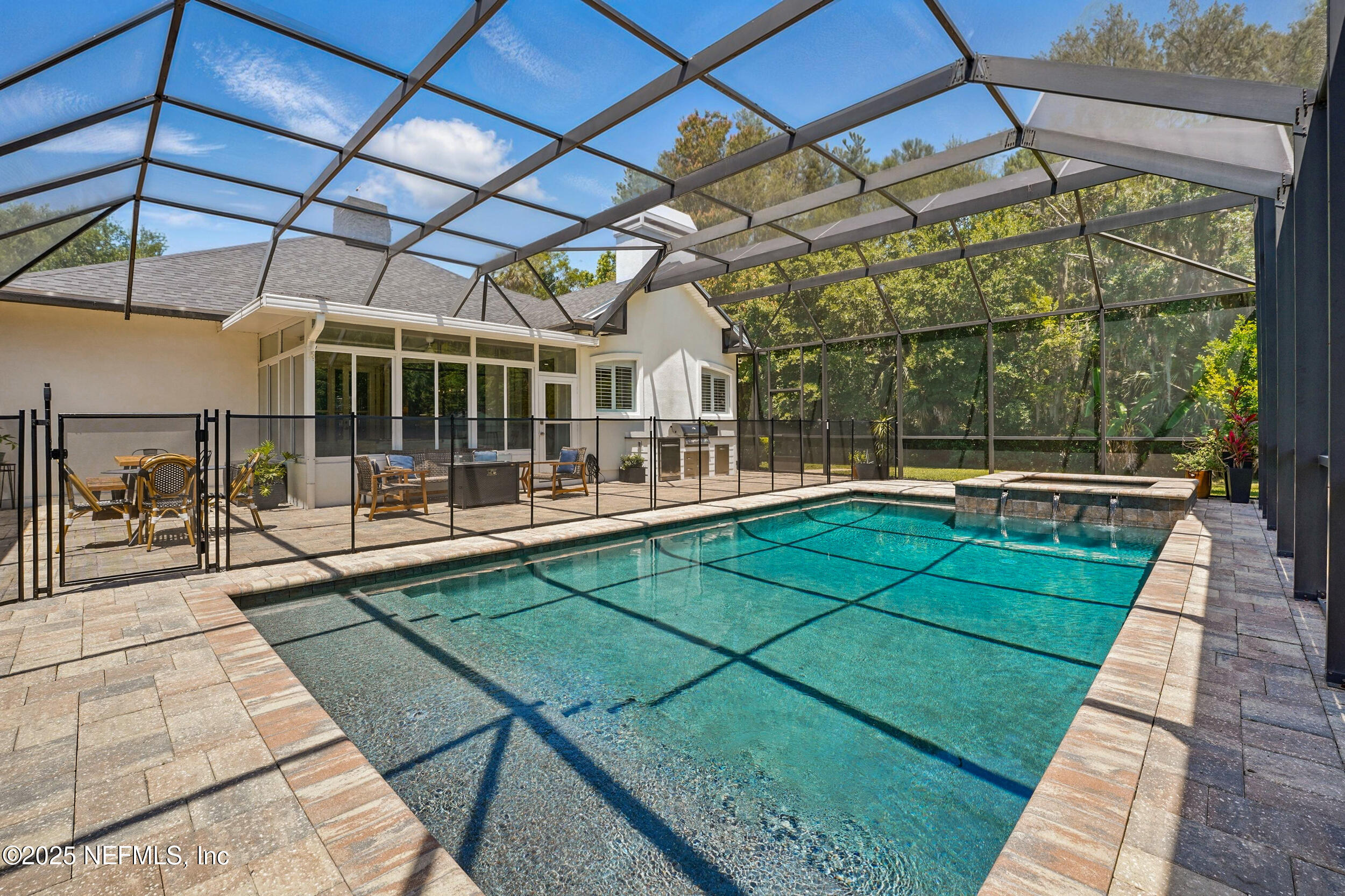 150 South Roscoe Boulevard Ponte Vedra Beach, FL 32082 - Photo 54 of 84 a view of a swimming pool with a patio