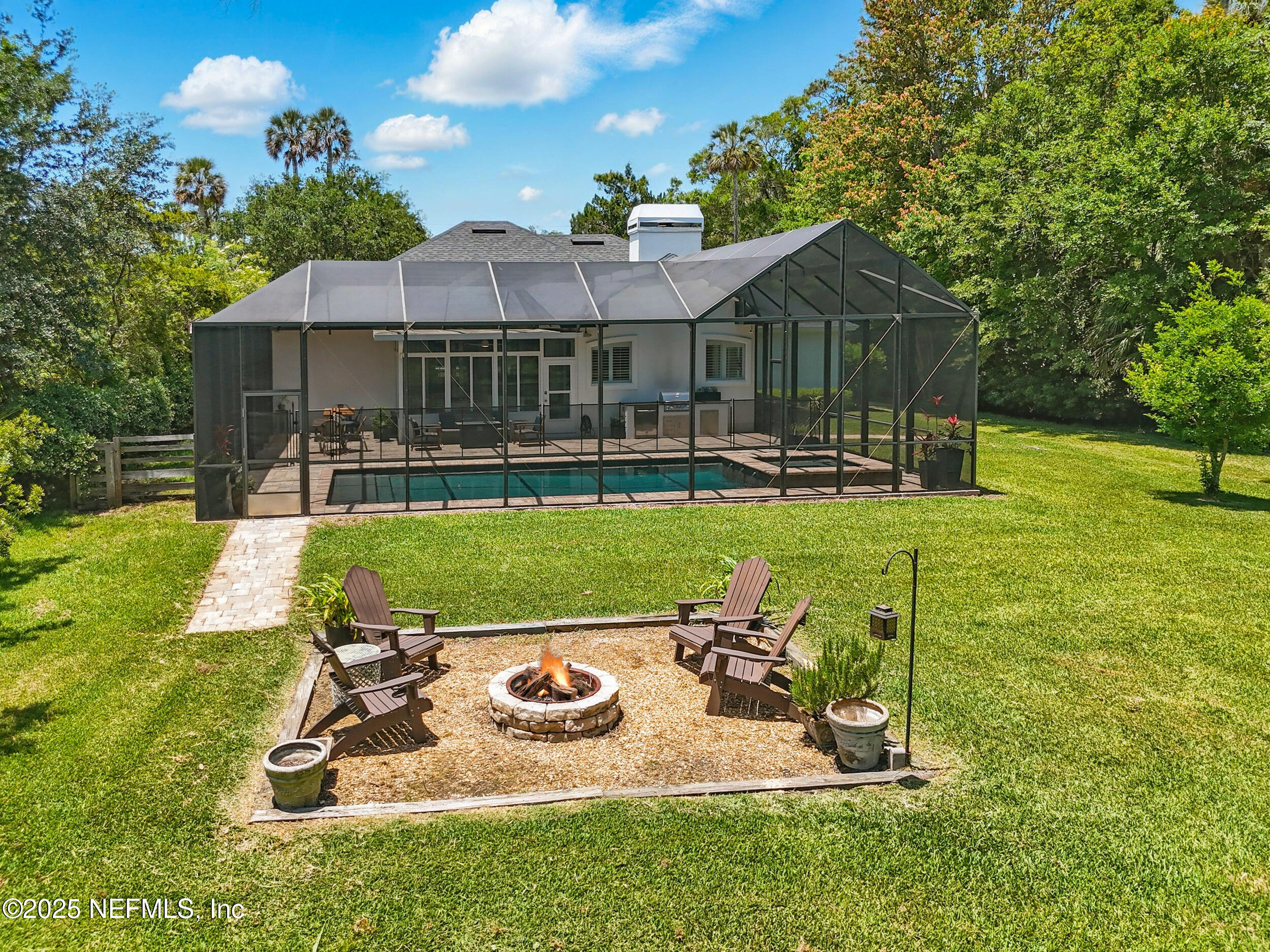 150 South Roscoe Boulevard Ponte Vedra Beach, FL 32082 - Photo 64 of 84 a view of a house with backyard and sitting area