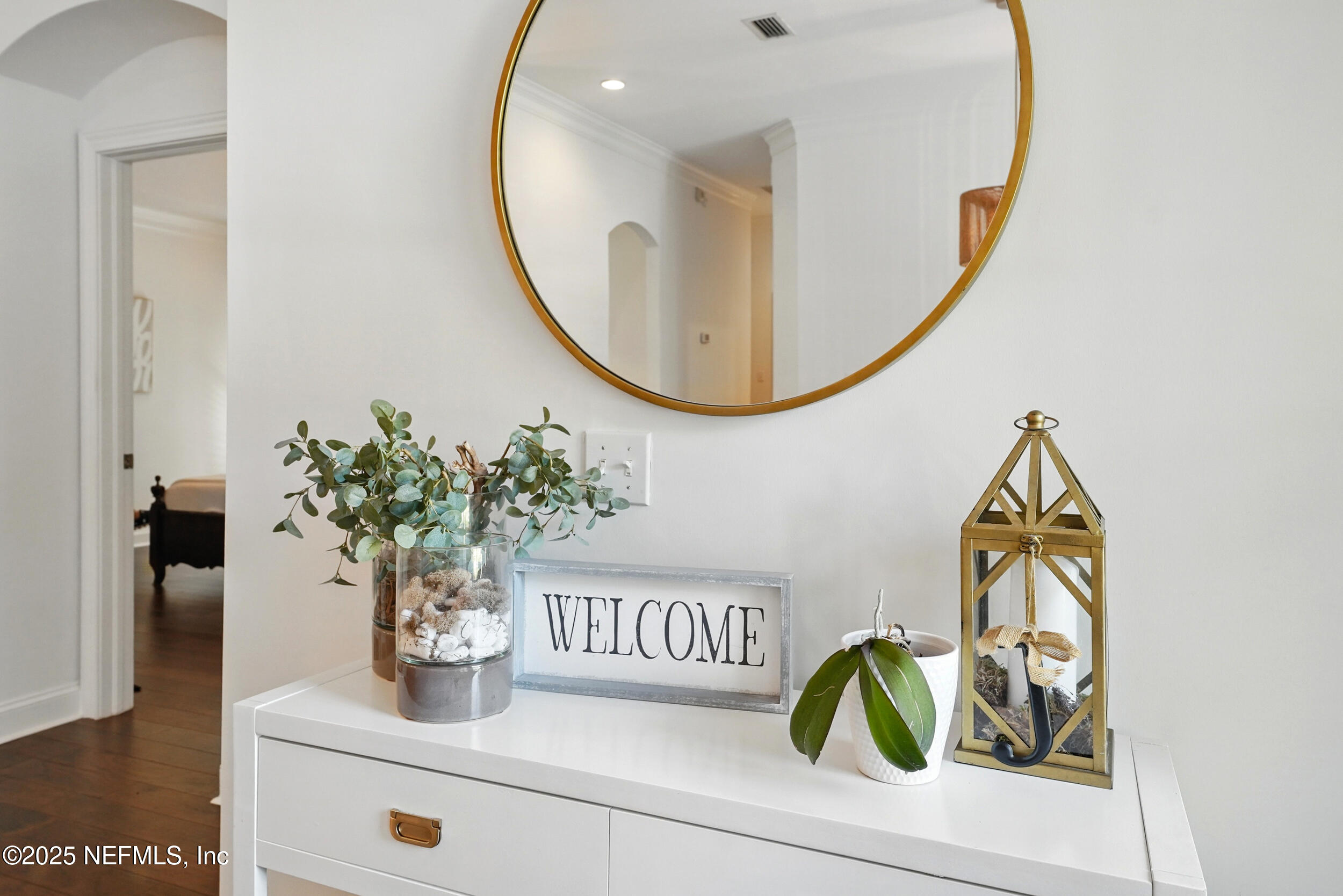 150 South Roscoe Boulevard Ponte Vedra Beach, FL 32082 - Photo 8 of 84 a bathroom with a sink a mirror and a potted plant
