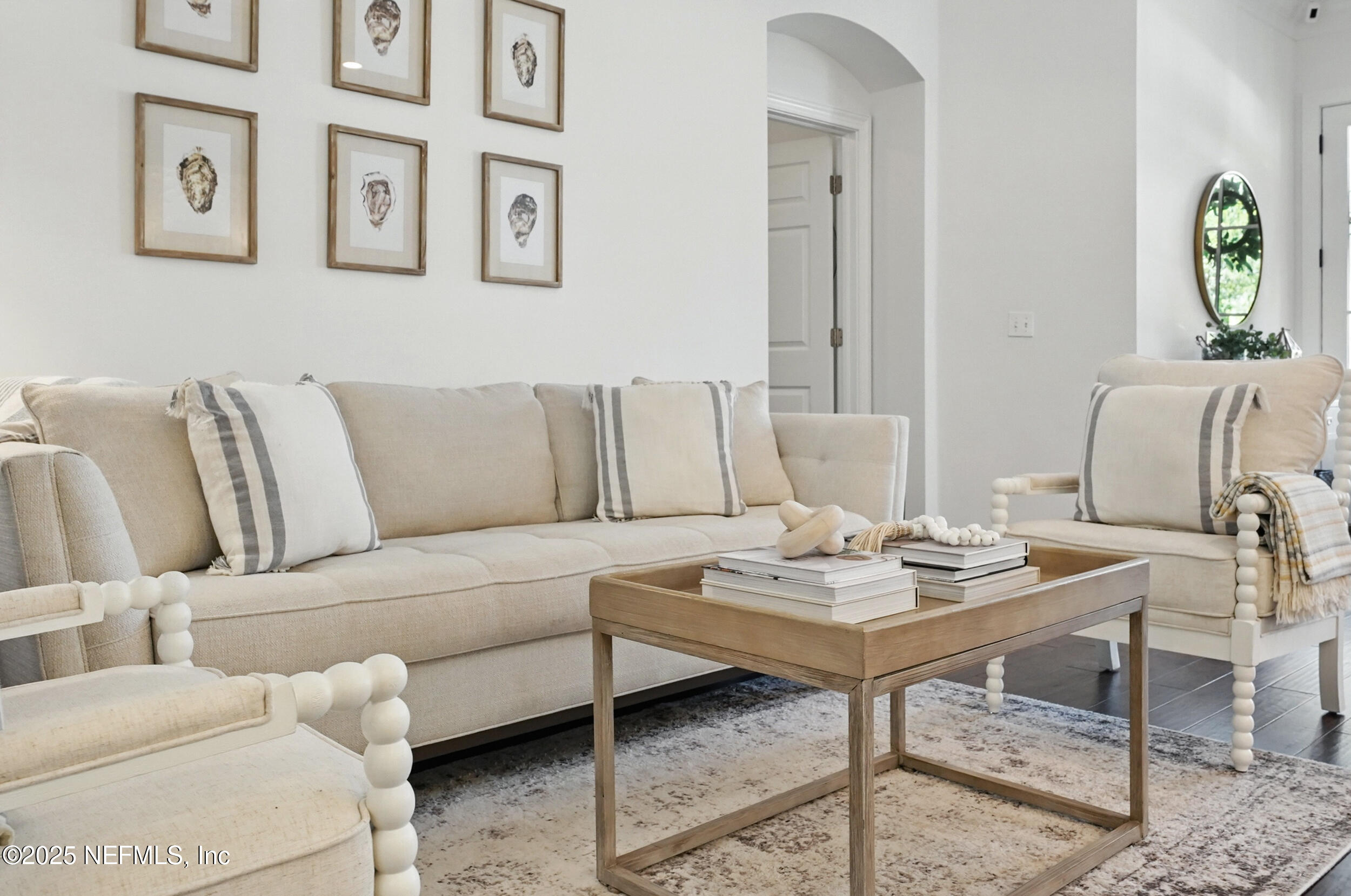 150 South Roscoe Boulevard Ponte Vedra Beach, FL 32082 - Photo 10 of 84 a living room with furniture and a table