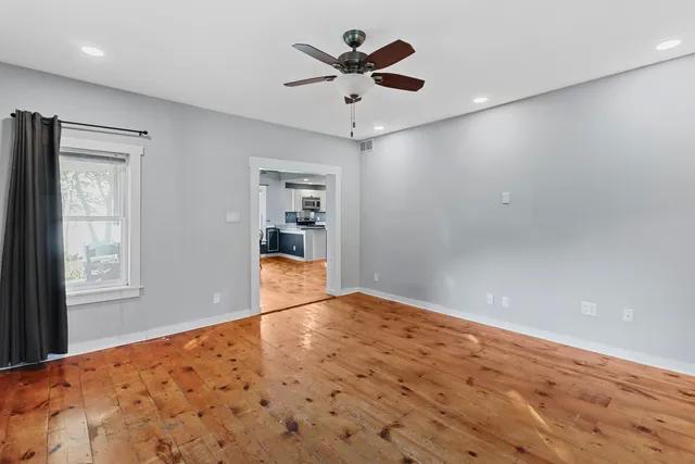 a view of an empty room and window