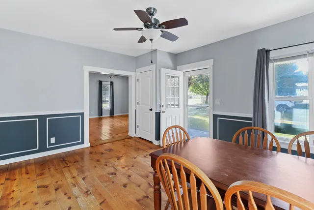 a view of a dining room with furniture