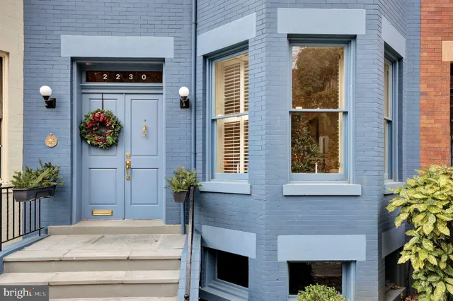 a front view of a house with garage