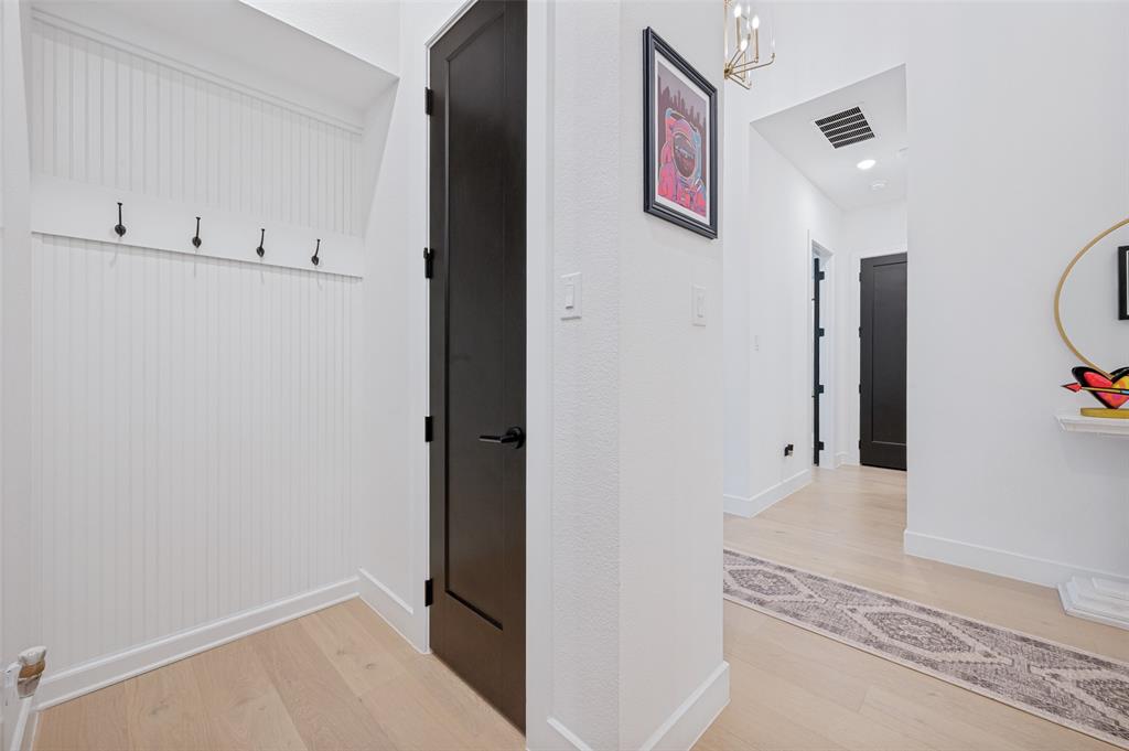 4400 Meander Way Prosper, TX 75078 - Photo 27 of 40 a view of a hallway with closet