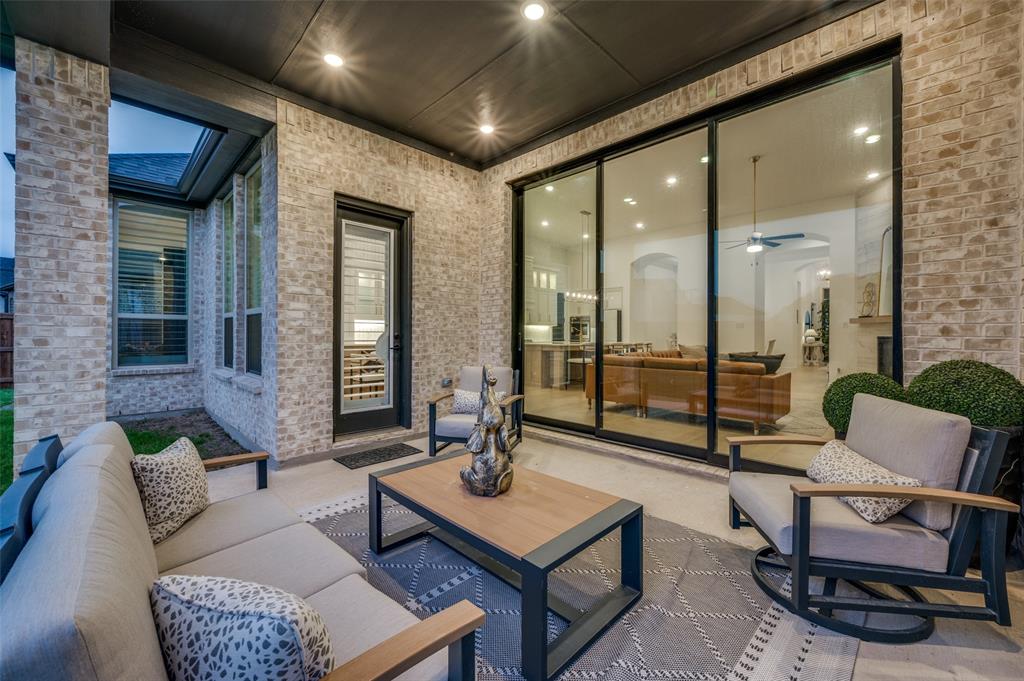 4400 Meander Way Prosper, TX 75078 - Photo 29 of 40 a living room with furniture and a large window