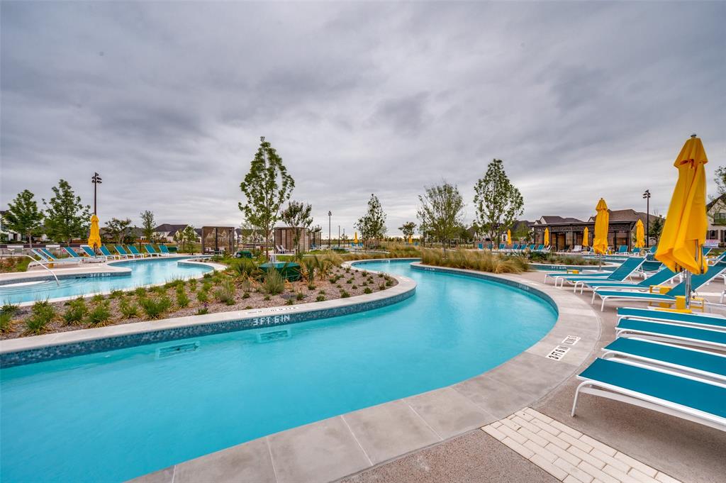 4400 Meander Way Prosper, TX 75078 - Photo 36 of 40 a view of a swimming pool with an ocean view