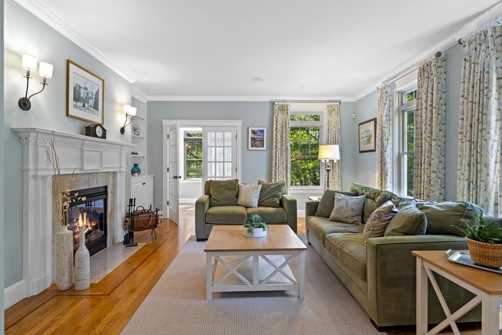 6 Captains Walk Lane Marblehead, MA 01945 - Photo 11 of 39 a living room with furniture and a fireplace