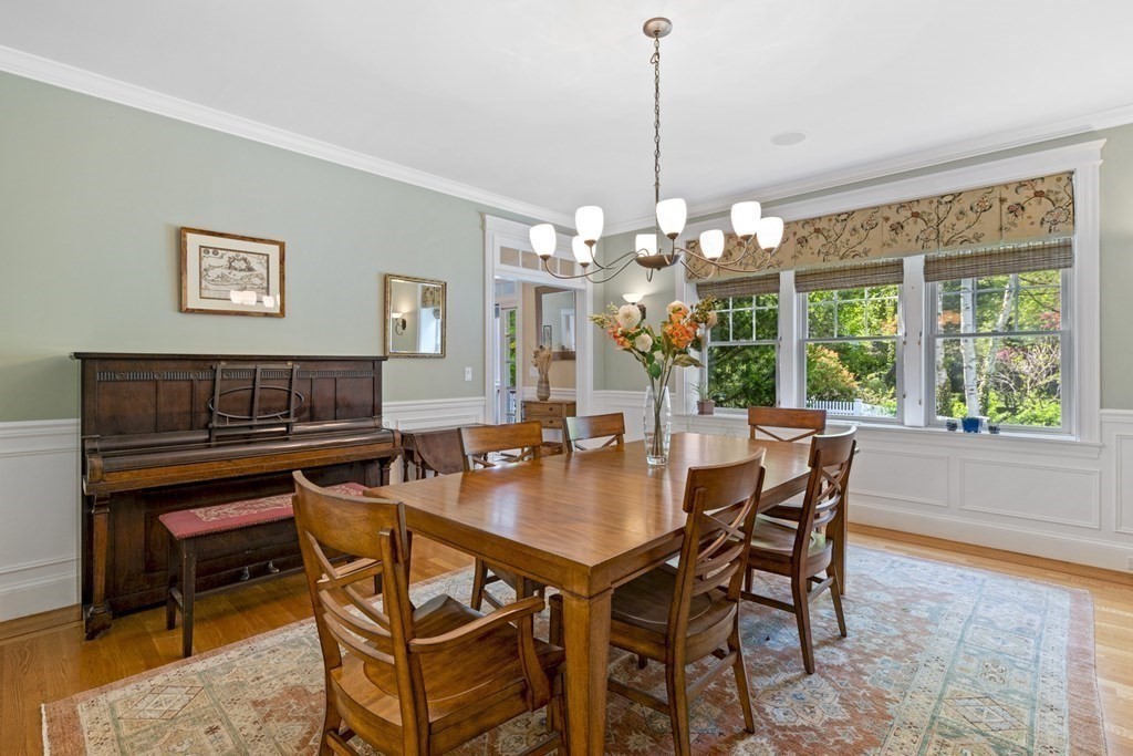 6 Captains Walk Lane Marblehead, MA 01945 - Photo 13 of 39 a view of a dining room with furniture wooden floor and chandelier