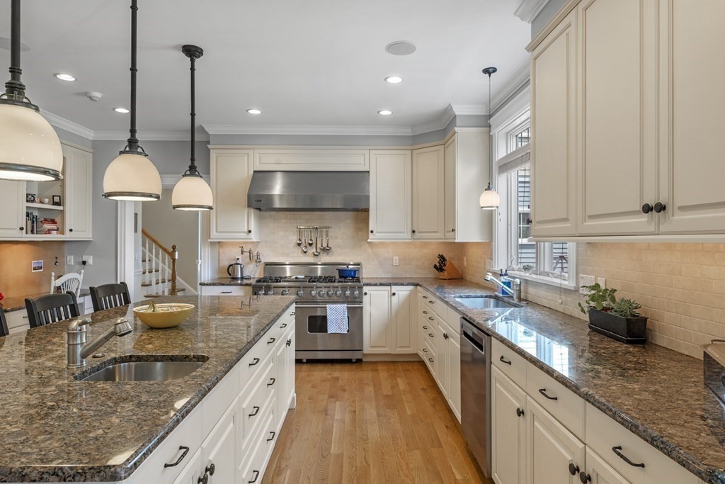 6 Captains Walk Lane Marblehead, MA 01945 - Photo 15 of 39 a large kitchen with granite countertop a sink a counter top space appliances and cabinets