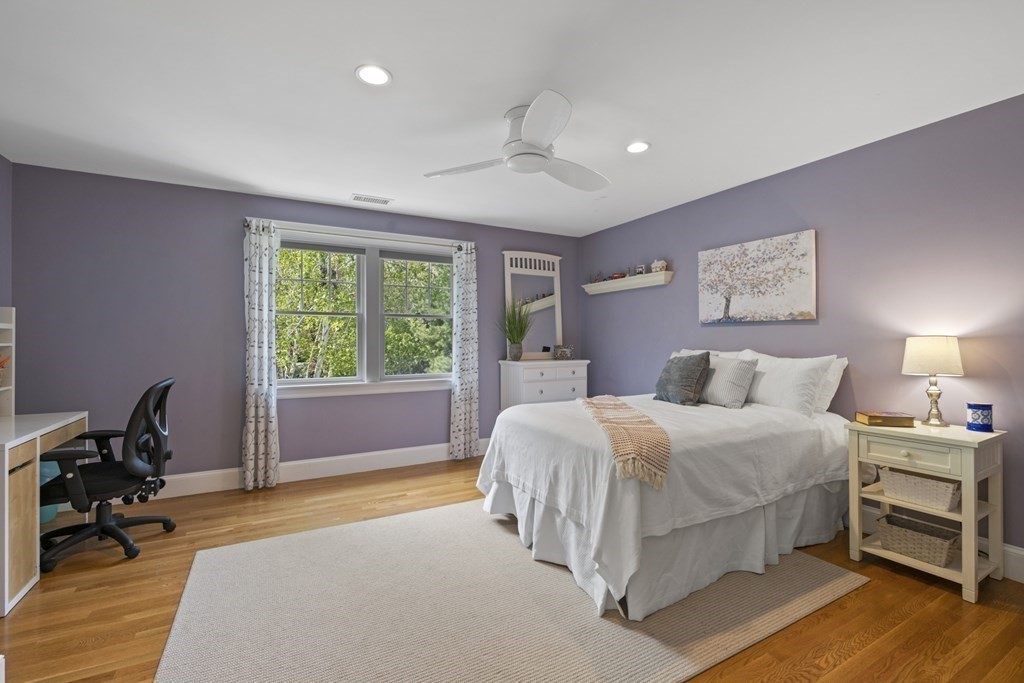 6 Captains Walk Lane Marblehead, MA 01945 - Photo 30 of 39 a bedroom with a bed and a desk